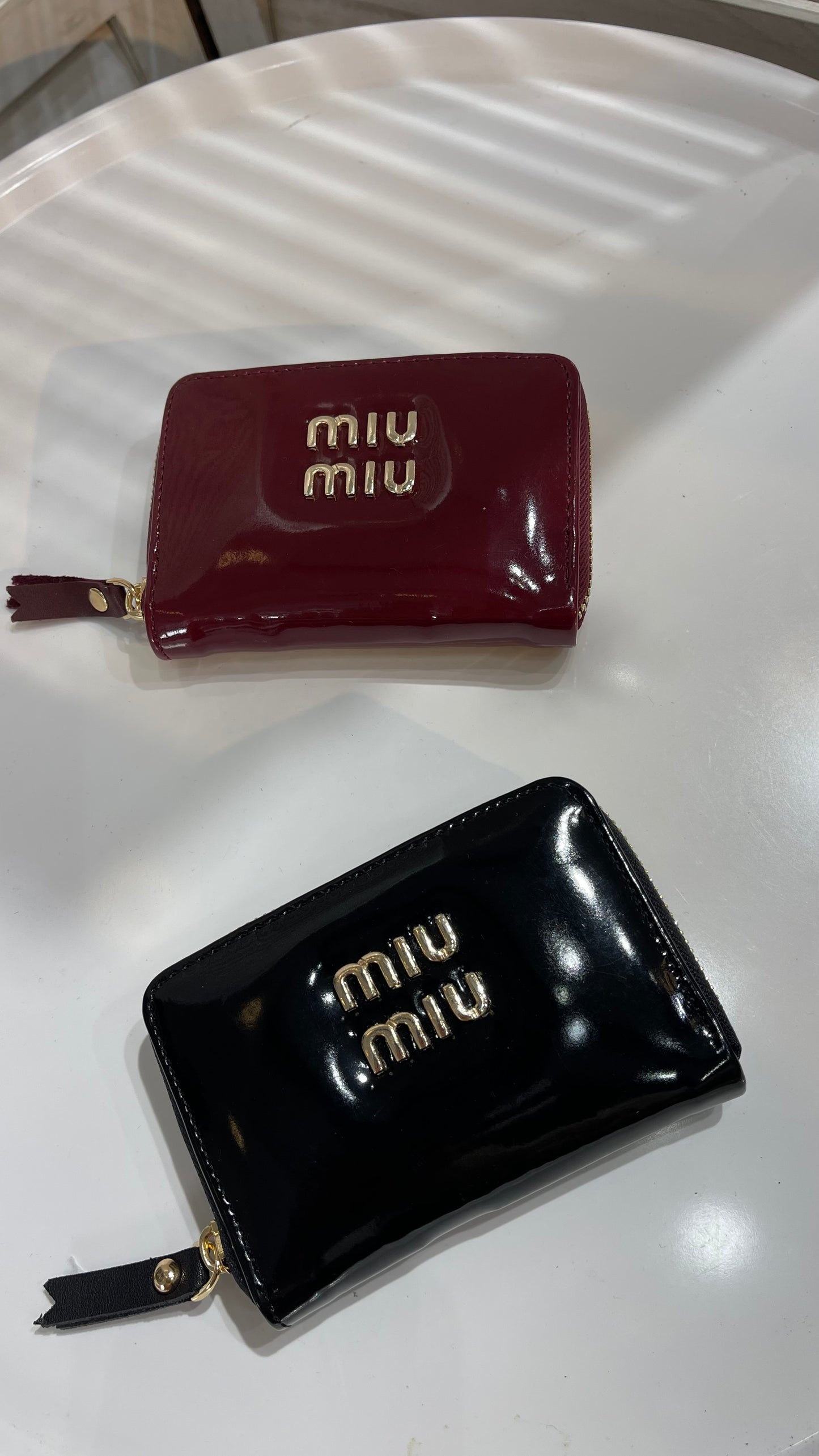 جزدان miu miu