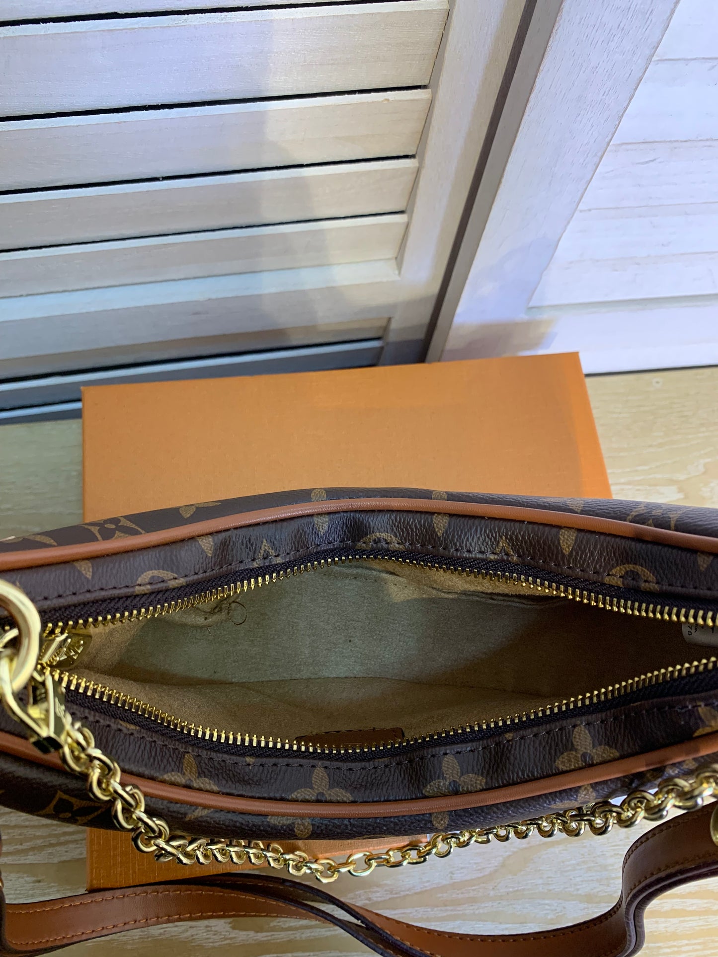 Louis Vuitton brown color with box